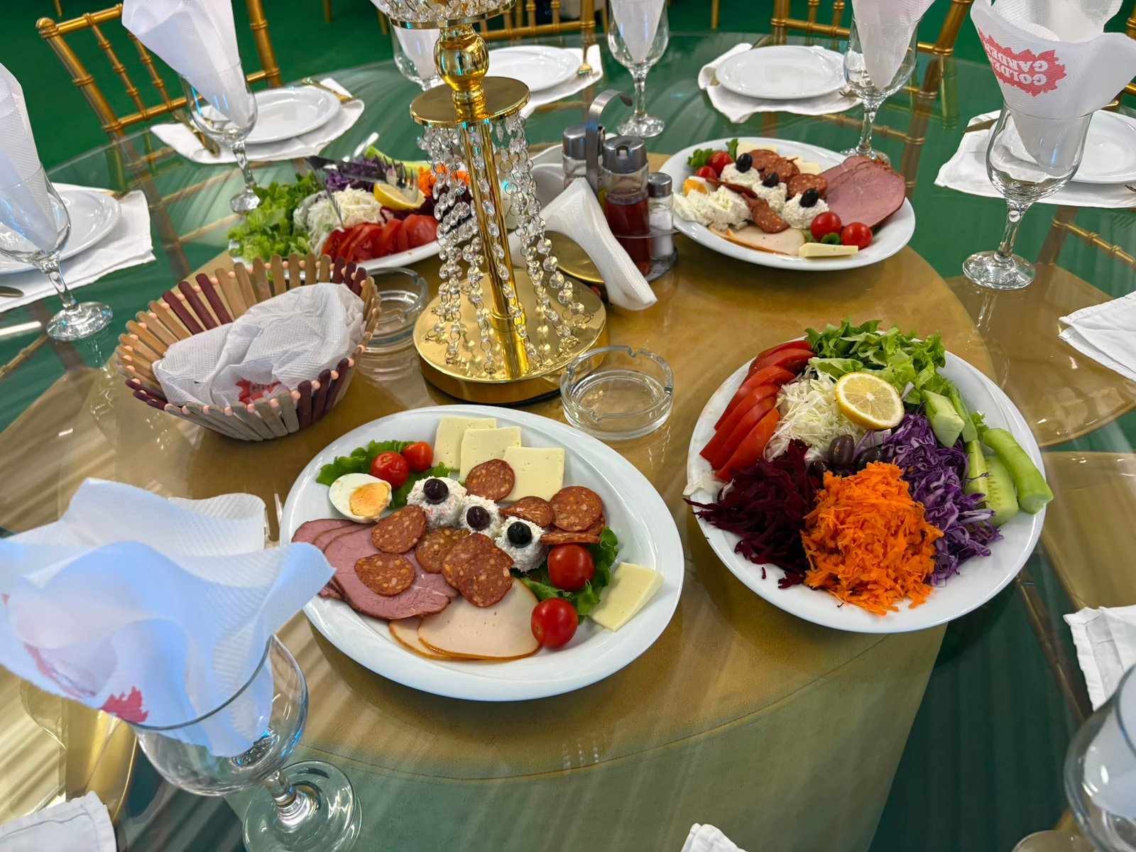 Banquet table with salads and meze by Golden Garden